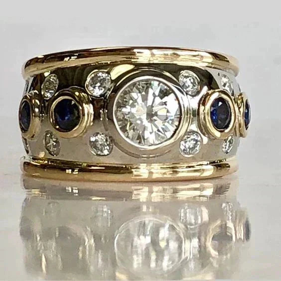 Vintage brede gouden ring met stenen