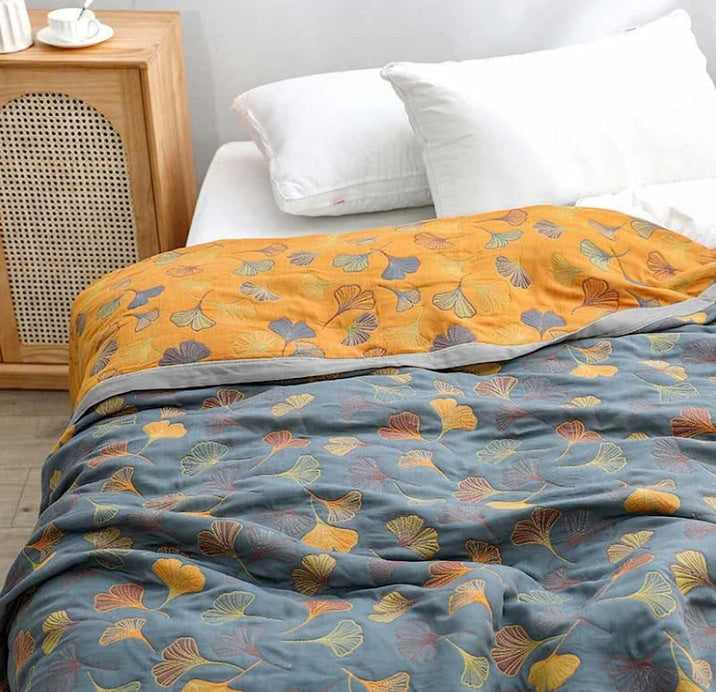 Decoratieve plaid geïnspireerd op de natuur voor in huis