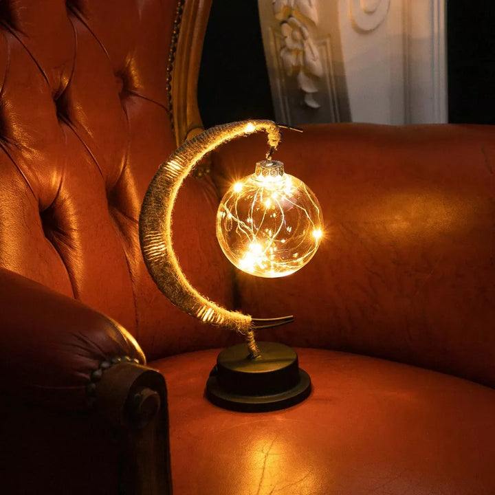 Decoratieve tafellamp met sfeervolle maangloed