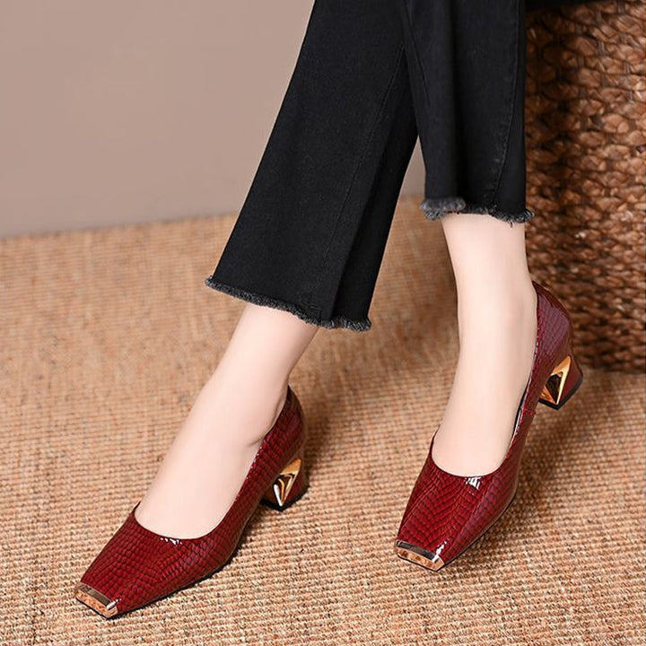 Pumps met slangenprint en vierkante neus