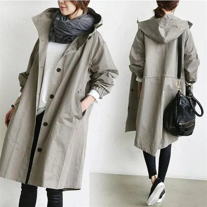 Lange damestrenchcoat met capuchon, waterdicht, oversized pasvorm