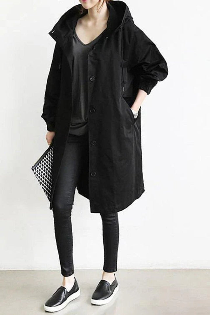 Lange damestrenchcoat met capuchon, waterdicht, oversized pasvorm